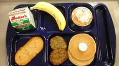 a blue tray with some food on it