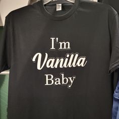 Gildan Heavy Cotton "I'm Vanilla Baby" Crew Neck Shirt Fits Very Comfortable And Looks Nice On Anyone Comes In Black Or Blue All Sizes Available Up To 2xl Black Funny Tops With Name Print, Funny Black Tops For Gender Reveal, Black Letter Print Shirt For Gender Reveal, Unisex Black Tops With Name Print, Funny Black T-shirt With Name Print, Cute Black T-shirt With Funny Text, Black T-shirt With Funny Text For Gender Reveal, Casual Shirt With Name Print For Gender Reveal, Black Crew Neck Top For Gender Reveal