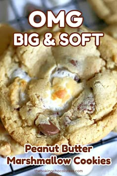 a close up of a cookie on a cooling rack with the words, omg and soft peanut butter marshmallow cookies