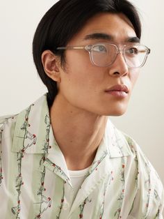 Bottega Veneta Eyewear's take on traditional aviator-style glasses is made from clear acetate. They're subtly detailed with the brand's triangle emblem at the temples and have visible gold-tone arms. Swap the lenses out for your prescription. Mens Eye Glasses Frames, Aviator Glasses Men, Clear Aviator Glasses, Glasses Aviator, Tone Arms, Style Glasses, White Shoes Sneakers, Aviator Glasses, Glasses Men