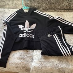 Matching Set Cropped Hoodie Nwt Never Worn Gently Worn Adidas Originals Leggings Can Be Sold Together Or As A Set Adidas Black Hoodie For Spring, Black Hoodie With Three Stripes For Streetwear, Black Athleisure Hoodie With Three Stripes Branding, Sporty Black Hoodie With Three Stripes, Casual Black Adidas Hoodie, Black Three Stripes Hoodie For Streetwear, Black Sporty Hoodie With Three Stripes Branding, Casual Black Adidas Logo Hoodie, Adidas Crew Neck Go-dry Tops