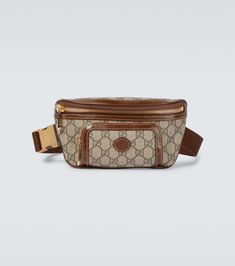 Crafted in the label's iconic GG Supreme canvas, this beige belt bag from the Gucci Aria collection has brown leather trims and golden hardware details. Gucci Aria, Canvas Belt, Gucci Shoulder Bag, Belt Bag, Leather Trims, Fall In Love, Brown Leather, Saint Laurent, In Love