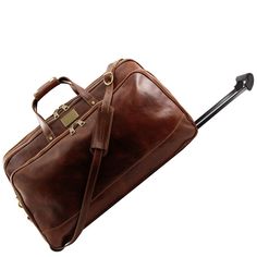 Embrace a fusion of elegance and adventure with our exquisite leather duffle bag on wheels. This sophisticated travel companion redefines your journeys, combining timeless luxury with impeccable functionality. Crafted with meticulous attention to detail, it's more than just a bag—it's a testament to artisanal excellence. Experience the allure of genuine, full-grain leather, meticulously hand-stained to achieve a rich, opulent texture. Each inch of this duffle bag tells a story of exceptional cra Duffle Bag Aesthetic, Travel Bag Set, Leather Factory, Trolley Bags, Leather Duffle Bag, Leather Travel Bag, Leather Duffle, Duffel Bag Travel, Bora Bora