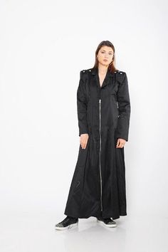 "Black Maxi Coat, Women Warm Coat, Steampunk Trench Coat ♛ All of Rosche's pieces are created with the sole purpose that YOU feel beautiful! Enjoy unique details in combination with high-quality materials every day and make a statement every place you go! ♛ Extravagant and casual at the same time. Comfortable and stylish. The floor length makes it look different and unique. Avant garde piece. Wear it both: with your sneakers or high heels. Long zipper closure. ♛ Perfect for every occasion! ♛ Cus Punk Long Sleeve Outerwear With Rivets, Black Gothic Biker Jacket With Rivets, Alternative Long Sleeve Outerwear With Rivets, Black Riveted Outerwear For Alternative Fashion, Edgy Black Outerwear With Rivets, Edgy Black Riveted Outerwear, Gothic Black Outerwear With Rivets, Riveted Long Sleeve Outerwear For Concert, Black Long Sleeve Biker Jacket With Rivets