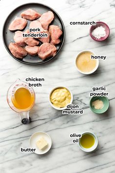 ingredients for chicken broth on a marble counter top