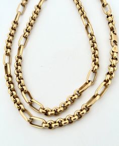 This vintage 14k yellow gold necklace is a true gem. Made in Italy, the chain is 24.5 inches long and weighs 18.2 grams. The necklace features a classic chain style and is crafted from high-quality yellow gold. With no stone, this necklace is perfect for everyday wear or as a special gift. The 14k metal purity ensures the necklace will last for years to come. Add this beautiful piece to your jewelry collection today. 5.5mm thick Yellow Gold Oval Necklace With Gold Chain, Oval Yellow Gold Necklace With Gold Chain, Timeless Yellow Gold Oval Link Necklace, Oval Yellow Gold Chain Necklace For Formal Occasions, Timeless Yellow Gold Oval Necklace, Classic Link Necklace With Gold Chain, Classic Link Gold Chain Necklace, Classic 14k Gold Necklace With Rectangular Links, Classic 14k Gold Oval Link Necklace