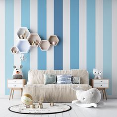 a living room with blue and white stripes on the wall, teddy bear sitting in front of it