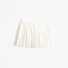 Ultra high rise mini skort in our lightweight suiting fabric featuring a shorts lining, wrap-front detail, all-over pleating details and a side zipper for a secure fit. Suiting Fabric, Wrap Mini Skirt, Women's Bottoms, Social Media Engagement, Abercrombie Kids, Minimal Fashion, Aesthetic Fashion, Side Zipper, Womens Bottoms