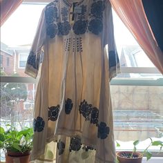 Brand New Free People Hand Embroidered Dress- Really Excellent Quality And Craftsmanship- Thought Of Wearing This At A Friends Wedding But Never Reached Out For This- And I Think The Style Doesn’t Suit Me Anymore! This Are Made So Well- Some Tiny Tiny Stains As Seen In The Pic- Xs But Oversized So It Would Fit A Small Or A Medium Spring V-neck Chikankari Embroidered Dress, Cotton V-neck Dress With Resham Embroidery, Traditional V-neck Boho Dress For Spring, Traditional Resham Embroidery Dresses For Spring, Summer V-neck Tunic With Chikankari Embroidery, Folk Style Long Sleeve Chikankari Dress, Spring Embroidered Long Dress, Long Embroidered Spring Dress, Casual Long Floral Embroidery Dresses