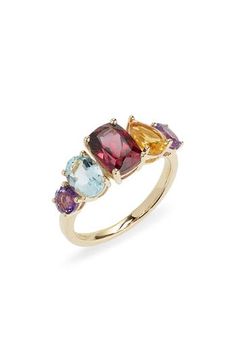 A rich rainbow of mixed stones arcs across this dreamy statement ring crafted from polished 14-karat gold. 1/4"W x X1"L setting 14k gold/rhodolite/aquamarine/citrine/amethyst Imported Multicolor Engagement Rings, Luxury Multicolor Ruby Ring, Luxury Multicolor 14k Gold Gemstones, Elegant Multicolor Amethyst Gemstone Ring, Elegant Multicolor Amethyst Ring With Gemstone Accents, Elegant Multicolor Multi-stone Ruby Ring, Elegant Multicolor Amethyst Ring With Accent Stones, Elegant Multicolor Ruby Ring With Accent Stones, Luxury Multi-stone Birthstone Ring