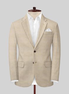 Make every occasion an opportunity to dazzle and delight with our Italian Cotton Silk Reyes Jacket, which evokes the vision of being extraordinary. Tailored with the finest weaves of cotton and silk blend, it whispers a soft touch upon the skin, and the beige shade casts a warm glow upon the wearer. The subtle dotted pattern lends an air of mystique amongst style mavens. Whether gracing high-class soirees or fancy formal gatherings, this jacket will grace your discerning taste and will leave an indelible impression on all.  
 
An elusive unique piece from our Red Carpet Collection. 
 
Look features a 2 button jacket with notch lapels, horn brown buttons, single vent and three cuff buttons.   Click 'Customize Now' to modify the look if needed.  
 
Lining: Viscose; Dry Clean. Fitted Beige Tweed Jacket With Long Sleeves, Beige Long Sleeve Tweed Jacket For Semi-formal Occasions, Beige Long Sleeve Blazer For Semi-formal Occasions, Beige Long Sleeve Blazer For Semi-formal, Beige Long Sleeve Semi-formal Blazer, Tailored Beige Tweed Jacket, Tailored Beige Tweed Jacket With Long Sleeves, Tailored Long Sleeve Beige Tweed Jacket, Silk Long Sleeve Business Casual Outerwear