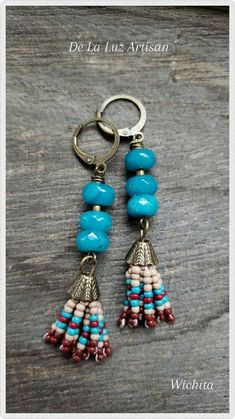 Bohemian Turquoise Tassel Earrings, Handmade Turquoise Tassel Earrings, Bohemian Turquoise Tassel Earrings With Colorful Beads, Turquoise Beaded Fringe Tassel Earrings For Festival, Turquoise Tassel Earrings With Colorful Beads For Festival, Festival Turquoise Tassel Earrings With Colorful Beads, Turquoise Handmade Tassel Earrings For Festivals, Turquoise Tassel Earrings With Round Beads, Handmade Turquoise Tassel Earrings For Festival