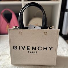 Hi, I’m Selling This Beautiful Givenchy G-Tote Mini Shopping Bag In Canvas, Brand New With Tag. Bought It From Department Store Retail Price $1,250+ Tax. This Is Your Must Have For Your Next Outing Bag! Super Versatile Bag Can Wear It Multi-Ways: Cross Body, Shoulder, Hand Carried With Top Handles. It Can Dress Up Or Down. 100% Authentic. Details: Mini G Tote Shopping Bag In Canvas. Tote Bag In Cotton Canvas And Linen To Be Carried By Hand Black Givenchy Paris Signature Printed On The Front Wide Givenchy Mini Tote Bag, Mini Shopping Bag, Givenchy Mini Antigona, Mini Antigona, Pandora Bag, Vintage Givenchy, Givenchy Bag, Maroon Leather, Givenchy Paris