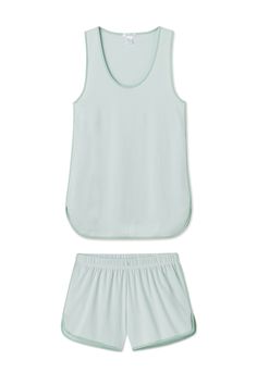 The Pima Tank-Short Set in Parisian Green, a soft stripe inspired by sidewalk cafés and the Luxembourg Gardens, features a sleeveless scoop neck top and shorts with an elastic waistband. Made from 100% Pima cotton. Lake Pajamas, Hydrangea Blue, Lake Style, Luxembourg Gardens, Nighttime Routine, Blue Candy, Green A, Green Tank, Ruffle Shorts