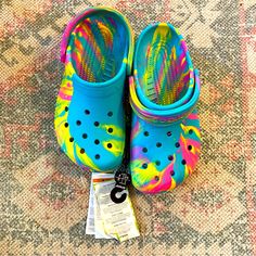 New Rainbow Tie Dye Crocs Size J4 Shoes, Sneakers, Multicolored, Multicolor, Pride, Unicorn, Cartoon, Edm, Neon, Glow In Dark, Music Festival, Cotton Candy Condition: Nwt New With Tags Size: J4 Colors: Blue, Pink, Yellow, Purple J4 Shoes, Rainbow Crocs, Crocs Tie Dye, Tie Dye Crocs, Dark Music, Unicorn Cartoon, Crocs Baya, Toddler Crocs, White Crocs