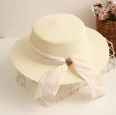 Product Category: Straw HatPopular elements: skirts, bows, tassels, irregular, plaid, squares, double rings, chains, asymmetryFor the season: SummerHat style: domeHat brim style: wide brimColor: khaki, black, pink, beige, pure white, ivory, redSize: M (56-58cm)Function: sun protection, neck protection, breathable, warm, windproof, sunshade, insect-proofSuitable for the crowd: adults, middle-aged, middle-aged, young, couples, students, women, menFabric name: StrawStyle classification: fresh and sweetStyle: adult straw hat, sun hat, sun hat, sun protection hat, beach hat Elegant Spring Hats For Picnic, Brimmed Boater Hat For Picnics, Chic Boater Hat With Ribbon For Beach, Chic Adjustable Hat With Bow, Elegant Fedora Sun Hat With Bow, Elegant Brimmed Sun Hat With Bow, Chic Sun Hat With Bow For Vacation, Chic Sun Hat With Bow For Summer, Chic Vacation Sun Hat With Bow