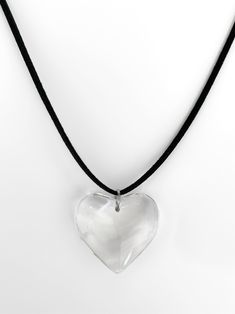 The necklace guaranteed to make your heart skip a beat - prepare to fall in love! Meet the limited edition 'FIRST DATE' suede wrap choker - featuring a large clear heart pendant strung alongside faux black suede leather, this piece will easily make a statement with any look! ♥ Made with a large clear glass heart pendant and faux black suede leather ♥ Rare heart pendants - limited quantity available ♥ 55" length - designed to allow you to tie this piece in multiple ways Handmade with love in Los Tie Choker, Clear Heart, Heart Pendants, Wrap Necklaces, Glass Heart, First Date, Leather Wraps, Black Suede, Heart Pendant