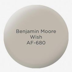 a white round with the words benjamin moore wish af - 60