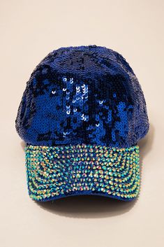 This ladies casual cap is bedazzled with sequins and rhinestones. This hat is a classic design that is lightweight and fashionable. Heads will turn as you make a statement with this hat. Size • Cap is adjustable. One size fits most• Length: 10.5 in (26.67 cm) • Width: 7 in (18 cm)• Height: 5 in (12.7 cm) Quality Cap made from 100% polyesterSequin and Studs are plastic acrylic Imported HTC594 Rhinestone Embellished One Size Baseball Cap, Rhinestone Baseball Cap One Size, Trendy Rhinestone Baseball Cap, Adjustable Blue Hat With Rhinestones, Blue Adjustable Hat With Rhinestones, Adjustable Baseball Cap With Bling, Trendy Rhinestone-embellished Cap, Trendy Rhinestone Cap, Trendy Snapback Hat With Rhinestones