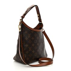 This is an authentic LOUIS VUITTON Reverse Monogram Dauphine Hobo PM. This stylish shoulder bag is crafted of Louis Vuitton monogram on toile canvas. The bag features a toffee-colored leather looping shoulder strap, an optional leather crossbody strap, and a front pocket with a decorative brass Louis Vuitton logo. The top opens to a spacious black fabric interior with a zipper pocket. Louis Vuitton Logo, Stylish Shoulder Bag, Colored Leather, Toffee, Crossbody Strap, Authentic Louis Vuitton, Black Fabric, Leather Crossbody, Front Pocket