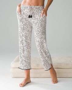 Why you’ll love it: Nearly 40% of women have trouble sleeping because they get hot or sweaty.* That’s no way to live! Our exclusive Cool Nights® PJs always feel cool and comfy against your skin for the best night’s sleep. These cropped pajama pants are edged in pom-pom trim for added style.. Comfortable style from Soma Intimates. Comfortable style with Soma Intimates. Details Cool Nights® fabric is made with lightweight rayon fibers that stay cool to the touch and keep the fabric from stick Comfortable Spring Sleepwear For Lounging, White Comfortable Sleepwear, Summer Sleepwear With Elastic Waistband, Comfortable Summer Pants For Pajama Party, Comfortable Relaxed Fit Pajama Pants, Comfortable Relaxed Fit Pants For Pajama Party, Comfortable Long Pants Sleepwear For Summer, Comfortable Long Pants Sleepwear, Casual Long Pants Sleepwear For Lounging