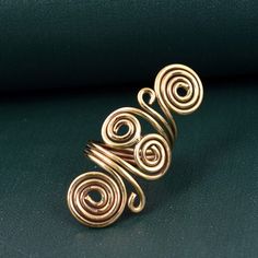 "Big Spiral Ring, Hypnotic Ring, Spiral Brass Ring, Swirl Ring, Gold Wired Ring, Handmade Dainty Ring, Boho Ring, Wired Band, Spiral Band Size:- All Size Available In Variation Metal:- Brass IMPORTANT NOTE....👇 1 product free gift on purchase of 3 products. You can choose the free gift as your wish. Take a screenshot of the free gift you like from my shop and send me a photo in personal message. MUST READ....👇 5 stars is my shop's priority. So contact me before leaving any negative review. I a Wired Ring, Gold Wire Ring, Full Finger Ring, Wire Jewelry Rings, Full Finger Rings, Wire Wrap Jewelry Designs, Spiral Ring, Zierlicher Ring, Swirl Ring