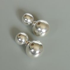 A pair of sterling silver ball studs. The small ball can be inserted into the big ball for closure. Dimensions: Small ball: 8mm Big ball: 12mm. Length: 21mm Weight: 3.60gm Price listed is for a PAIR of hoops. These earrings are made of 925 hypoallergenic sterling silver Can be packaged in a gift box. I can include a personal message from you if needed You are welcome to contact me at... bhavnakwintra1956@gmail.com For more beautiful pieces from my shop, please browse 👇 TOE RINGS: https://www.et Cartilage Stud, Big Balls, Bohemian Earrings, Toe Rings, Ear Studs, Bohemian Jewelry, Personal Message, Double Sided, Silver Jewelry