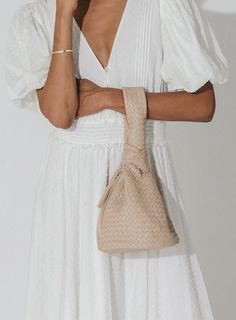 Celine Woven Handbag - Endless Waves Beige Pouch Baguette Bag With Dust Bag, Top Handle Baguette Bag For Errands, Evening Bucket Bag With Braided Handles, Beige Leather Baguette Bag Pouch, Versatile Pouch Bag With Braided Handles, Evening Leather Shoulder Bag In Natural Color, Everyday Leather Baguette Bag With Dust Bag, Chic Tote Baguette Bag With Leather Handles, Natural Leather Shoulder Bag For Evening