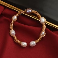 * Buy 2 baroque pearl bracelets and receive a free jewelry organizer * Buy more than 2 baroque pearl bracelets to receive a $10 discount and a free mirror jewelry organizer Baroque Freshwater Real Dainty Baroque Pearl Bracelet Gold Design | Girls Pearl Bracelet| Pearl And Gold Bracelet For Weddings 14K gold baroque pearl bracelet, available in four beautiful colors; pink, white, grey and black and green. Add a touch of elegance to any outfit with our collection of classic and handmade baroque pe Gold Baroque Pearl Bracelet For Gift, Gift Gold Baroque Pearl Bracelet, Elegant Pearl Jewelry, Pearl Bangle Bracelet, Pearl Bracelet Gold, Free Mirror, Gold Baroque, Buy Pearls, Pearl Bracelets