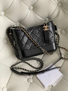 Chanel Gabriel Hobo small in black calfskin leather matelassè with a dual colour iconic chain. The bag is in pristine condition.Comes with the whole storage set. Hologram: 28xxxxxx Year: 2019 Measurements: 21 x 16 x 9 cm