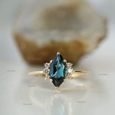 Pretty and simple Teal Sapphire diamond engagement ring. The stones can also be of other shape or kind. Gorgeous Marquise Teal Sapphire Diamond Ring, Stackable Beautiful Ring, Delicate Gemstone Ring, Wedding/Engagement Beautiful Jewelry. Product info: ★Details ★ SKU Code : 1162 ★Purity : Solid 14k Gold ( Also available in 9k & 18k Solid Gold) ★Metal : Yellow Gold ( Also available in Rose Gold & White Gold) ★Gemstone : 100 % Genuine Teal Sapphire ( Also available in Other Gemstone) ★Stone Shape : Baguette Diamond Earrings, Single Diamond Ring, Diamond Sapphire Engagement Ring, Sapphire Diamond Engagement, Teal Sapphire, Ring Marquise, Bar Stud Earrings, Pave Diamond Ring, Solid Gold Ring