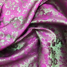 a pink and green floral print fabric