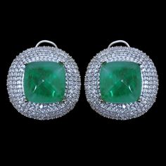 Emerald Doublet Earrings features semi precious green stone and cz diamonds in round shape. Ideal to pair with your design outfits and bridal wedding gown. These LUXURY Statement Green Pariba Tourmaline Earrings surely elevate your look. Perfect Gift For her. *𝐏𝐑𝐎𝐃𝐔𝐂𝐓 𝐃𝐄𝐓𝐀𝐈𝐋* * 𝐌𝐚𝐭𝐞𝐫𝐢𝐚𝐥: Brass * 𝐏𝐥𝐚𝐭𝐢𝐧𝐠: White Rhodium Plated * 𝐒𝐭𝐨𝐧𝐞: AAA-quality CZ Diamond & Emerald Doublet. *𝐃𝐈𝐌𝐄𝐍𝐒𝐈𝐎𝐍𝐒* * 𝐖𝐞𝐢𝐠𝐡𝐭: 11 gm each * 𝐋𝐞𝐧𝐠𝐭𝐡: 1.1 I Inches * 𝐖𝐢𝐝𝐭 Green Hand-set Diamond Earrings, Formal Green Gemstone Diamond Earrings, Formal Green Diamond Gemstone Earrings, Green Hand Set Diamond Earrings, Green Diamond Pave Setting Jewelry, Green Diamond Jewelry With Pave Setting, Luxury Green Earrings With Prong Setting, Green Luxury Earrings With Prong Setting, Fine Jewelry Green Diamond Earrings