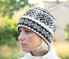 This is a cuffed hat with fleece lining. The hat is very warm! It is suitable for low temperatures and skiing experiences. Made out of natural lambswool in Estonia. Beautiful black Fair Isle pattern on the white background. Fashionable and high-quality products are made out of lambswool in Nordic and Scandinavian styles. All items are high-quality and have unique designs. If you are looking for a high-quality Christmas present or just casual accessories for cold winter days, these products will Fair Isle Beanie Hats For Winter, Winter Fair Isle Pattern Beanie Hat, Winter Fair Isle Beanie Hats, Nordic Warm Hats For Cold Weather, Nordic Warm Beanie For Cold Weather, Nordic Style Winter Hat For Outdoor Activities, Warm Nordic Hats For Cold Weather, Nordic Style Warm Hats For Cold Weather, Warm Nordic Hats For Outdoor