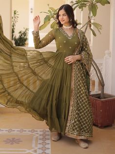 Introducing our stunning "adorable olive green embroidered georgette mehendi wear gown", a classy and elegant choice for your next special event. This beautifully crafted gown comes in a rich olive green color with intricate embroidered and sequin work, making it a perfect outfit for festivals, events, or any function.
This gown include a fully stitched design in sizes ranging from XS to XXL, a generous 15-meter flair for a glamorous look, and a gown length of 56 inches. The accompanying georget Embroidered Green Floor-length Anarkali Set, Green Embroidered Floor-length Anarkali Set, Green Floor-length Anarkali Set With Intricate Embroidery, Green Georgette Gown With Intricate Embroidery, Festive Anarkali Maxi Dress With Chikankari Embroidery, Green Traditional Wear With Intricate Embroidery Floor-length, Green Floor-length Traditional Wear With Intricate Embroidery, Embroidered Green Maxi Lehenga, Green Embroidered Maxi Lehenga