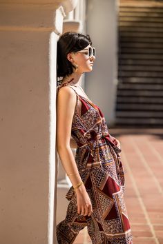 This luxe bohemian scarf dress is perfect for all-season styling. Wear alone in the summer, or over a long sleeve tee in the winter. Adjustable tie shoulder straps create versatility and size inclusion! Belt or use the included waist tie as a fabulous matching headpiece. Made from a slinky rayon blend georgette and lots of love! One size fits most up to size 22. Machine wash cold and hang dry. Bohemian Wrap Dress For Day Out, Bohemian Midi Dress With Tie Waist And V-neck, Bohemian Summer Midi Dress With Adjustable Straps, Bohemian Midi Dress With Adjustable Straps For Summer, Chic Tie Waist Midi Dress For Vacation, Bohemian Sleeveless Maxi Dress With Knotted Straps, Chic Tie Waist Maxi Dress For Daytime, Chic Boho Print Sleeveless Sundress, Chic Sleeveless Boho Print Sundress