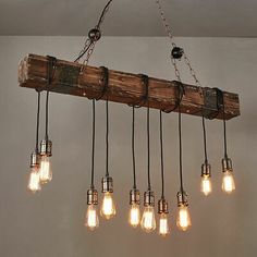 a wooden beam with six light bulbs hanging from it