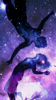 two people standing in the middle of a space filled with stars, and one person is reaching