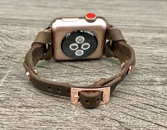 7mm Rustic Brown Genuine Leather Bracelet. Gorgeous Design Slim Leather Jewelry Tailored to Perfection. Designed And Handmade by Simeon D Jewelry Studio. This Bracelet Fits ALL Apple Watch Series. Please Measure Your Wrist Before Submitting Your Order! Not For Other Models. Apple Watch Is NOT Included. Let's be Friends! Follow my Studio on Social Media Instagram @simeondjewelry Pinterest @simeondjewelry Facebook @simeondjewelrystudio Luxury Handmade Adjustable Watch Bands, Luxury Handmade Adjustable Watch Accessories, Vintage Adjustable Apple Watch Band, Vintage Adjustable Apple Watch Band Rectangular, Vintage Adjustable Bracelet Strap Apple Watch Band, Adjustable Vintage Bracelet Strap Apple Watch Band, Brown Adjustable Bracelet Strap Watch Band, Adjustable Apple Watch Band For Everyday Use, Adjustable Brown Bracelet Strap Watch Band