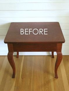 a small wooden table with the word before painted on it's top and bottom