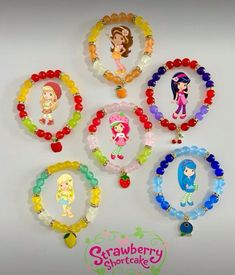 six bracelets with cartoon characters on them