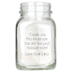 a glass jar with the words, thank you mrs anderson and teacher's love from family