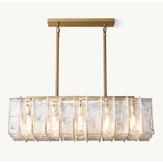 a large rectangular light fixture with five lights hanging from it's side and six glass bags on the bottom