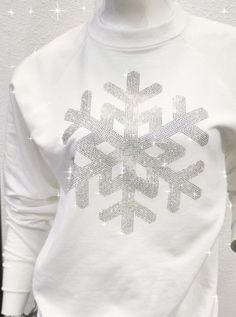 Rhinestone Snowflake sweatshirt, Holiday shirt, Cute Christmas shirt, Bling snowflake shirt, Great gift, Christmas shirt Super cute and festive snowflake bling sweatshirt. This holiday sweatshirt if perfect for the season. Classic bling snowflake brings the spirit of the season without being over the top. Great to wear to the office Christmas party, happy hour, or holiday shopping.  All our designs are made using our high quality, multi-cut rhinestones. They are super sparkly and pictures do not Snowflake Sweatshirt, The Office Christmas Party, Snowflake Shirt, The Office Christmas, Rhinestone Snowflake, Cute Christmas Shirt, Office Christmas Party, Christmas Float, Cute Christmas Shirts