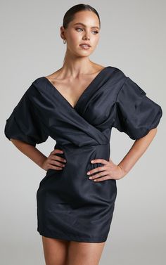 Show off a sexy sophistication in the Anastasija Dress! This stunning mini has an alluring off-the-shoulder neckline, elbow-length puff sleeves and a fitted waist with darts at the skirt for a slim fit. It's highly chic and perfect to wear for special events or occasions. Pop it on for date night with layered necklaces, hoops and some block heels for a sleek finish!Product DetailsInvisible zipper on the centre backOff-the-shoulder V-necklineElbow-length balloon sleeves with elasticated cuffsGath Off Shoulder V Neck, Off Shoulder Mini Dress, Pop It, Pin Tucks, Balloon Sleeves, V Neck Dress, Layered Necklaces, Puff Sleeves, Off Shoulder Dress