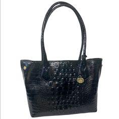 Brahim Glossy Anytime Tote -100% Glossy, Croc Embossed Leather -Suede Like Signature Brahmin Lining -Interior: 2 Slip Pockets/1 Zip Pocket -Metal Purse Feet -Gold-Tone Hardware -Gold Logo Tag W/Protective Plastic Still Attached -Side Snaps For Style Versatility -Magnetic Top Snap Closure -Double Leather Rolled Straps -Certificate Of Authenticity Included -Dust Bag Included -Style #G89547bk -Size: 9”H X 11.5”L X 5”W -9” Drop -Excellent Condition! Bottom Of Purse Does Have Weird Pattern On One Side (See Pics) Free People Rings, Metal Purse, Brahmin Bags, Metallic Purse, Genuine Leather Totes, Leather Roll, Logo Tag, Suede Fringe, Crocodile Leather