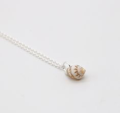 SALE - Mini Shell Necklace Drilled small natural shell hung on an 18 inch sterling silver chain. Dainty & delicate the shell measures 13mm Packaged in a Yemaya cotton pouch. Please not due to the nature of the shell the colour and pattern may vary slightly from picture shown White Sterling Silver Shell Necklace For Gift, White Sterling Silver Shell Necklace As Gift, White Sterling Silver Shell For Beach, Sterling Silver Shell Necklace For Beach, Boho Surf, Beach Jewellery, Surf Jewelry, Cowrie Shell Necklace, Necklace Packaging