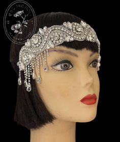 Gorgeous Art Deco Silver Crystal headpiece. Step into the world of  elegance and capture the essence of the roaring 1920s with this exquisite Art Deco Crystal Chains Headpiece. Inspired by the iconic Gatsby era, this headpiece is meticulously crafted to elevate your style to new heights of sophistication. The headpiece features a stunning arrangement of crystal chains in a tassel style that delicately flowing down the sides, creating a mesmerizing display of light and sparkle.  Whether you're attending a glamorous soirée, a Gatsby-themed party, or simply seeking to add a touch of vintage charm to your everyday look, this Art Deco Crystal Chains Headpiece is the ultimate accessory to make a bold statement .  This is "EVA "   Hypnotic beauty Custom orders are taken upon request. Please messa 20s Headpiece, Silver Headpiece, Crystal Headpiece Wedding, Roaring 1920s, Flapper Headpiece, Headband Crystal, Chain Headband, Chain Headpiece, Gatsby Themed Party