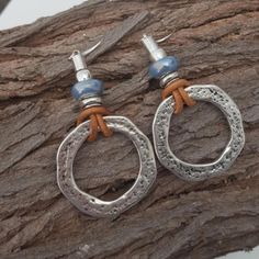 Silver Dangle Earrings, Iridescent Blue And Brown Leather. Unique Dangle Earrings, Silver Circle Earrings, Spiral Shell, Bead Projects, Spiral Earrings, Long Drop Earrings, Fish Hook Earrings, Big Earrings, Silver Earrings Dangle