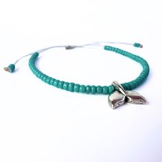 Whale Tail Beaded Anklet, Opaque Turquoise Seed Beads, White Waterproof Cord, Ankle Bracelet, Adjustable, Silver Charm, Summer Jewelry, Gift - Etsy Handmade Flexible Beaded Bracelets For Beach, Adjustable Turquoise Strand Friendship Bracelets, Adjustable Strand Turquoise Bracelet, Adjustable Turquoise Strand Bracelet, Adjustable Beaded Anklet As A Gift, Turquoise Beaded Bracelets With Sliding Knot For Beach, Turquoise Beaded Friendship Bracelets For Beach, Turquoise Strand Bracelets For Festival, Turquoise Beaded Friendship Bracelets For Summer